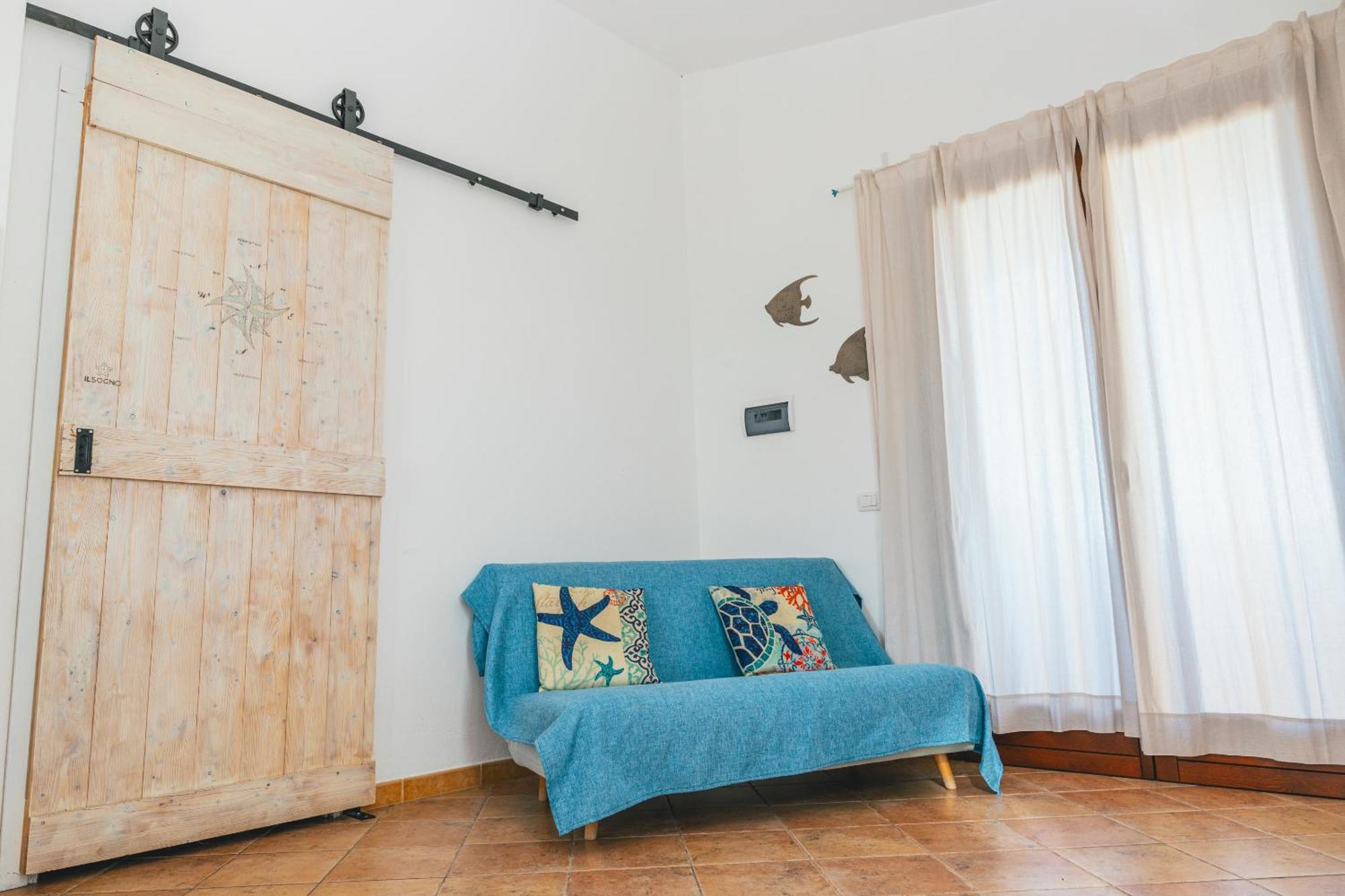 Case Vacanze Il Sogno Porto Pino Exterior foto
